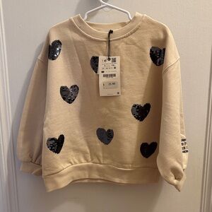 Zara Cream Sweater with Black Heart Accents